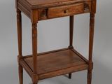 an image of a small table with a drawer on it