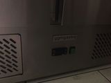an image of a stainless steel refrigerator in a kitchen
