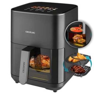 un gros plan d'une friteuse à air chaud contenant des aliments