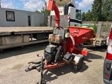une image représentant un tracteur auquel est attelée une machine à l'arrière