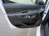 a car door open with the driver ' s side door open