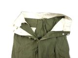 an image of a green jacket with a white hood on a white background