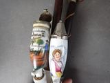 two small vases that have been painted on them