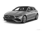 a silver mercedes cla parked in front of a white background