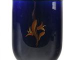 a blue vase with a gold decoration on it
