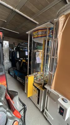 a video game machine in the middle of a room