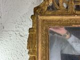 a man taking a picture of himself in a mirror