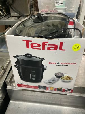 a box that has a pot on top of it