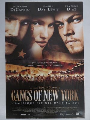 L'affiche du film « Gangs of New York » est accrochée au mur.