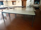 a long table in the middle of a large room