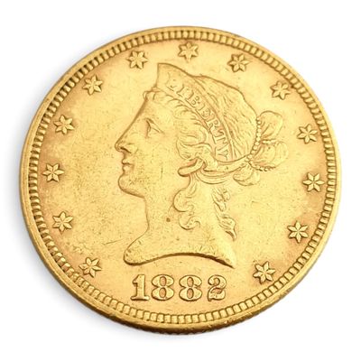 l'image d'une pièce d'or sur laquelle figure une tête de femme