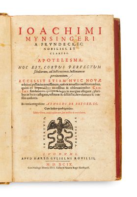 an open book with a picture of a bird on top of it