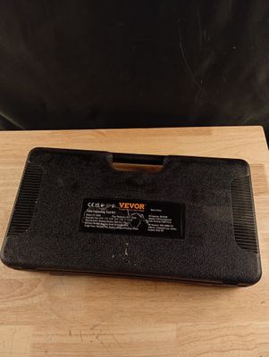 an open laptop computer sitting on top of a wooden table