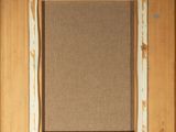 an old picture frame with a brown background and a white border