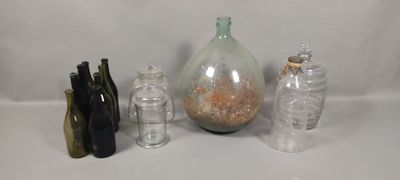 many bottles and bottles that are sitting on a table