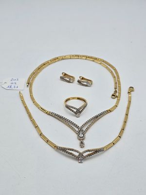 a collection of jewellery including a necklace, bracelet and ring
