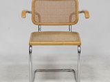 an image of a chair with a woven seat and backrest