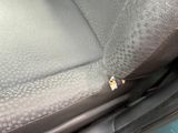 an image of a car seat with a hole in it