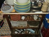 a table with many plates and bowls on it