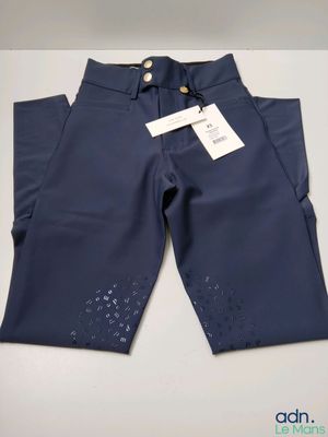 a close up of a pair of blue pants with a tag on it