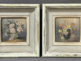 painting of a pair of flowers in a vase on a table