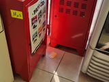 two refrigerators that are sitting next to each other in a store