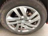a close up of a tire on a car ' s rim