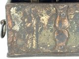 an old metal box with a handle on a white background