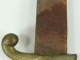 a knife that is sitting on top of a stand