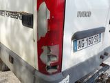 a white van parked on the side of the road