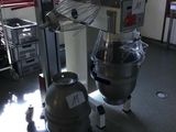 an image of a kitchen with a mixer and other appliances