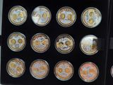 a picture of a display case with a variety of coins