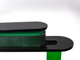 a black table with a green table top on it