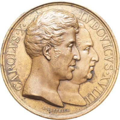 l'image d'une pièce d'or sur laquelle figurent deux visages, celui d'une femme et celui d'un homme