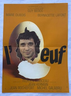 une image représentant une affiche de film sur laquelle figure le visage d'un homme dans une coquille d'œuf