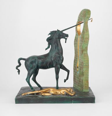 bronze statue of a horse with a spear on its head