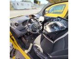 a picture of a car dashboard with a yellow car in the background