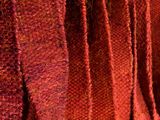 an image of a close up of a red sweater