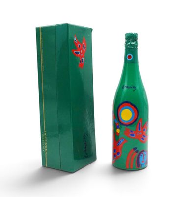 an image of a bottle of wine sitting next to a box