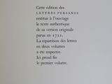 a black and white photo of a poem on a wall