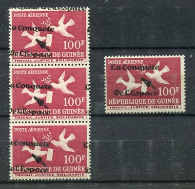 four stamps with birds on them on a black surface