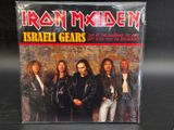 an album with a picture of a group of men standing in front of a wall