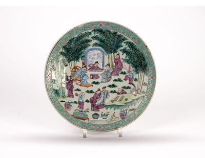 an image of a plate with a painting of people in a garden