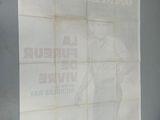 a picture of a poster on the wall of a building