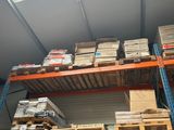 many boxes and boxes on the shelves in the warehouse