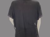 a mannequin mannequin wearing a black top and black pants