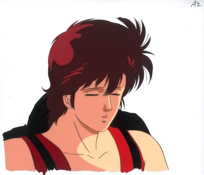 la photo d'un homme portant une chemise rouge et un gilet noir