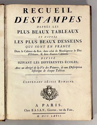 an old book with a black and white image of a woman ' s face on it