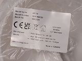 a plastic bag with a label on it sitting on a table