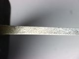 a knife that is sitting on top of a table